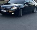 Черный Тойота Авалон, объемом двигателя 3.5 л и пробегом 320 тыс. км за 11500 $, фото 1 на Automoto.ua