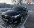 Черный Тойота Авалон, объемом двигателя 2.49 л и пробегом 299 тыс. км за 15000 $, фото 1 на Automoto.ua