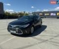 Черный Тойота Авалон, объемом двигателя 2.49 л и пробегом 305 тыс. км за 14800 $, фото 1 на Automoto.ua
