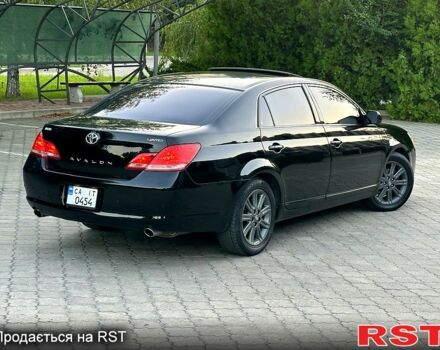 Черный Тойота Авалон, объемом двигателя 3.5 л и пробегом 301 тыс. км за 6900 $, фото 1 на Automoto.ua