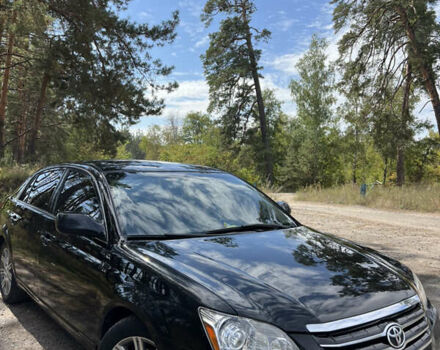 Черный Тойота Авалон, объемом двигателя 3.5 л и пробегом 325 тыс. км за 9990 $, фото 1 на Automoto.ua