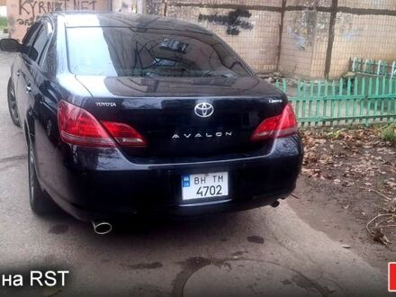 Черный Тойота Авалон, объемом двигателя 3.5 л и пробегом 220 тыс. км за 10500 $, фото 1 на Automoto.ua