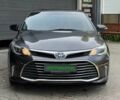 Серый Тойота Авалон, объемом двигателя 2.5 л и пробегом 210 тыс. км за 14900 $, фото 2 на Automoto.ua