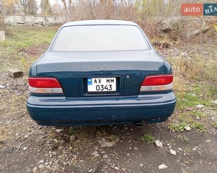 Зеленый Тойота Авалон, объемом двигателя 3 л и пробегом 100 тыс. км за 2500 $, фото 1 на Automoto.ua