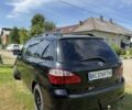Черный Тойота Авенсис Версо, объемом двигателя 2 л и пробегом 230 тыс. км за 4100 $, фото 2 на Automoto.ua