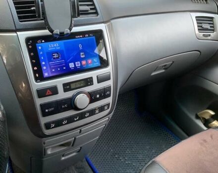 Серый Тойота Авенсис Версо, объемом двигателя 2 л и пробегом 256 тыс. км за 5500 $, фото 11 на Automoto.ua