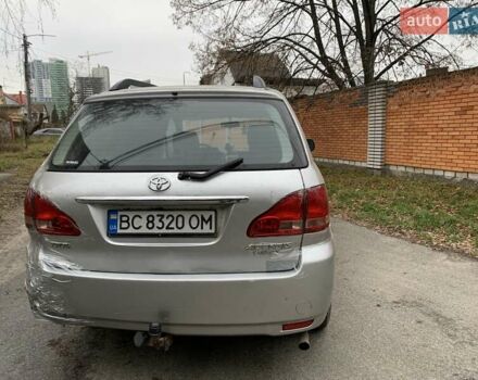 Серый Тойота Авенсис Версо, объемом двигателя 2 л и пробегом 267 тыс. км за 3880 $, фото 4 на Automoto.ua