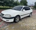 Белый Тойота Авенсис, объемом двигателя 2 л и пробегом 300 тыс. км за 3550 $, фото 1 на Automoto.ua