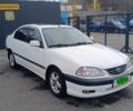 Белый Тойота Авенсис, объемом двигателя 2 л и пробегом 399 тыс. км за 3800 $, фото 1 на Automoto.ua