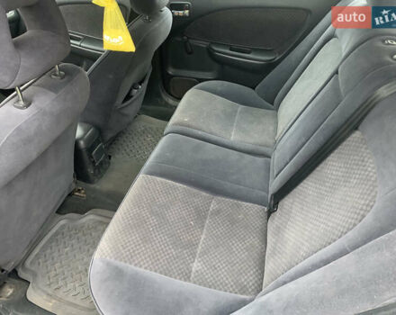 Белый Тойота Авенсис, объемом двигателя 2 л и пробегом 250 тыс. км за 3600 $, фото 7 на Automoto.ua