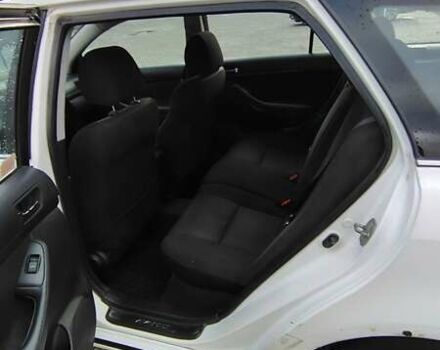 Белый Тойота Авенсис, объемом двигателя 1.99 л и пробегом 280 тыс. км за 4500 $, фото 7 на Automoto.ua