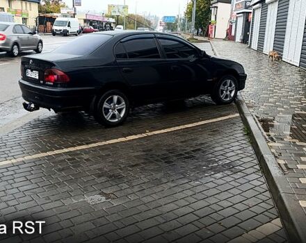 Черный Тойота Авенсис, объемом двигателя 2 л и пробегом 300 тыс. км за 3500 $, фото 1 на Automoto.ua