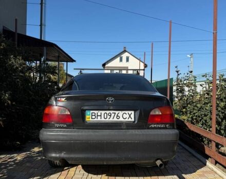 Черный Тойота Авенсис, объемом двигателя 1.8 л и пробегом 400 тыс. км за 2599 $, фото 3 на Automoto.ua