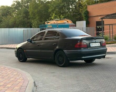 Черный Тойота Авенсис, объемом двигателя 2 л и пробегом 461 тыс. км за 3500 $, фото 5 на Automoto.ua