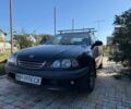 Черный Тойота Авенсис, объемом двигателя 1.8 л и пробегом 400 тыс. км за 2599 $, фото 1 на Automoto.ua