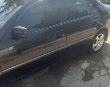 Черный Тойота Авенсис, объемом двигателя 2 л и пробегом 300 тыс. км за 3600 $, фото 5 на Automoto.ua