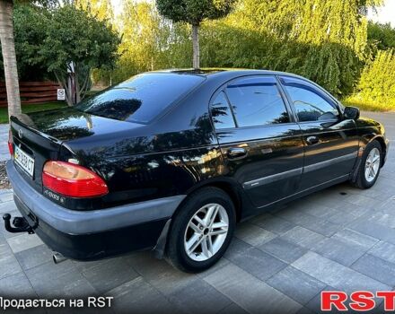 Черный Тойота Авенсис, объемом двигателя 2 л и пробегом 255 тыс. км за 3150 $, фото 5 на Automoto.ua