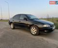 Чорний Тойота Авенсіс, об'ємом двигуна 1.99 л та пробігом 252 тис. км за 3300 $, фото 1 на Automoto.ua