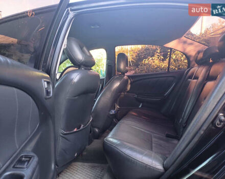Чорний Тойота Авенсіс, об'ємом двигуна 1.99 л та пробігом 252 тис. км за 3300 $, фото 10 на Automoto.ua