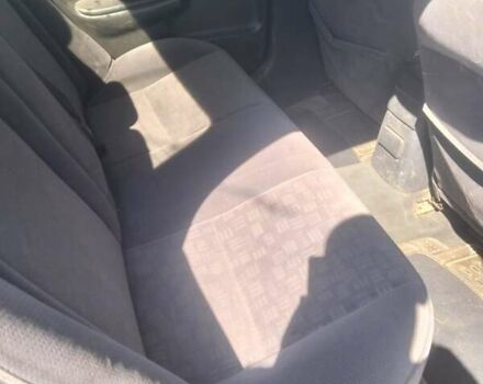 Черный Тойота Авенсис, объемом двигателя 2 л и пробегом 300 тыс. км за 3600 $, фото 2 на Automoto.ua