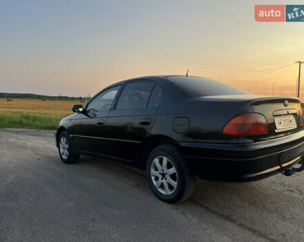 Чорний Тойота Авенсіс, об'ємом двигуна 1.99 л та пробігом 252 тис. км за 3300 $, фото 4 на Automoto.ua