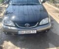 Черный Тойота Авенсис, объемом двигателя 2 л и пробегом 300 тыс. км за 3600 $, фото 1 на Automoto.ua