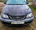 Черный Тойота Авенсис, объемом двигателя 2 л и пробегом 450 тыс. км за 4000 $, фото 1 на Automoto.ua