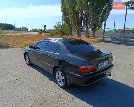 Черный Тойота Авенсис, объемом двигателя 2 л и пробегом 385 тыс. км за 3850 $, фото 5 на Automoto.ua
