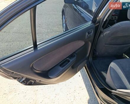 Черный Тойота Авенсис, объемом двигателя 2 л и пробегом 385 тыс. км за 3850 $, фото 12 на Automoto.ua