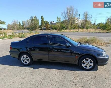 Черный Тойота Авенсис, объемом двигателя 2 л и пробегом 385 тыс. км за 3850 $, фото 2 на Automoto.ua