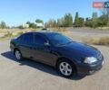 Черный Тойота Авенсис, объемом двигателя 2 л и пробегом 385 тыс. км за 3850 $, фото 1 на Automoto.ua