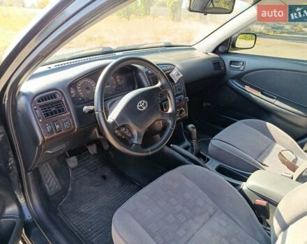 Черный Тойота Авенсис, объемом двигателя 2 л и пробегом 385 тыс. км за 3850 $, фото 13 на Automoto.ua