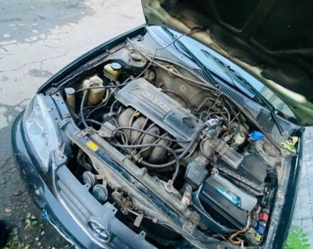 Черный Тойота Авенсис, объемом двигателя 1.8 л и пробегом 400 тыс. км за 1695 $, фото 1 на Automoto.ua
