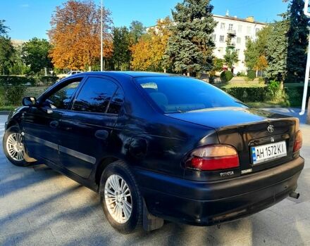 Черный Тойота Авенсис, объемом двигателя 1.8 л и пробегом 186 тыс. км за 1640 $, фото 2 на Automoto.ua