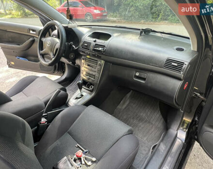 Черный Тойота Авенсис, объемом двигателя 2 л и пробегом 255 тыс. км за 6000 $, фото 2 на Automoto.ua