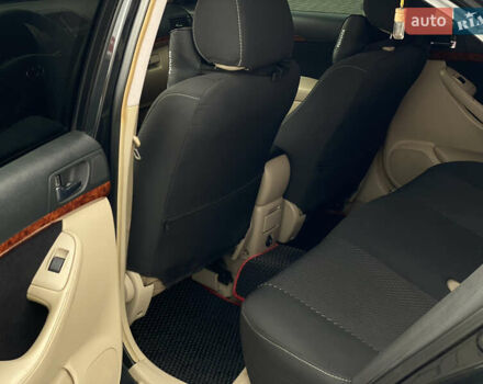 Черный Тойота Авенсис, объемом двигателя 2 л и пробегом 400 тыс. км за 5899 $, фото 9 на Automoto.ua