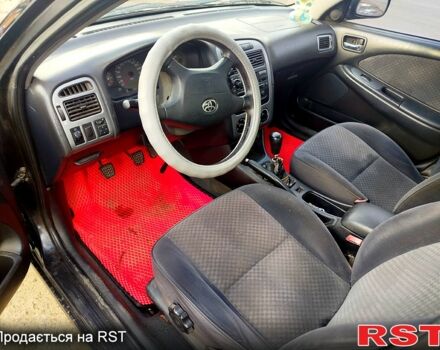 Чорний Тойота Авенсіс, об'ємом двигуна 1.8 л та пробігом 250 тис. км за 3000 $, фото 5 на Automoto.ua