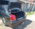 Черный Тойота Авенсис, объемом двигателя 1.8 л и пробегом 240 тыс. км за 6000 $, фото 1 на Automoto.ua