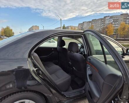 Черный Тойота Авенсис, объемом двигателя 2.36 л и пробегом 225 тыс. км за 5850 $, фото 6 на Automoto.ua