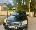 Черный Тойота Авенсис, объемом двигателя 1.8 л и пробегом 260 тыс. км за 4700 $, фото 1 на Automoto.ua