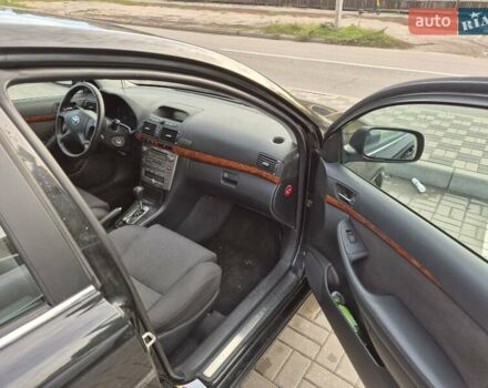Черный Тойота Авенсис, объемом двигателя 2.36 л и пробегом 225 тыс. км за 5850 $, фото 5 на Automoto.ua