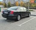 Черный Тойота Авенсис, объемом двигателя 2.36 л и пробегом 225 тыс. км за 5850 $, фото 2 на Automoto.ua