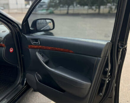 Чорний Тойота Авенсіс, об'ємом двигуна 1.8 л та пробігом 220 тис. км за 5699 $, фото 12 на Automoto.ua