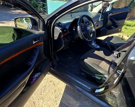 Черный Тойота Авенсис, объемом двигателя 1.8 л и пробегом 143 тыс. км за 7000 $, фото 1 на Automoto.ua