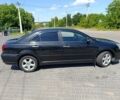 Чорний Тойота Авенсіс, об'ємом двигуна 2 л та пробігом 219 тис. км за 6500 $, фото 7 на Automoto.ua