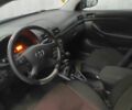 Черный Тойота Авенсис, объемом двигателя 1.8 л и пробегом 333 тыс. км за 5000 $, фото 2 на Automoto.ua