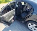 Чорний Тойота Авенсіс, об'ємом двигуна 2 л та пробігом 219 тис. км за 6500 $, фото 5 на Automoto.ua