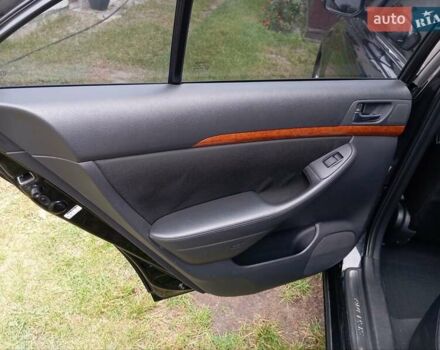 Черный Тойота Авенсис, объемом двигателя 1.79 л и пробегом 218 тыс. км за 7200 $, фото 12 на Automoto.ua