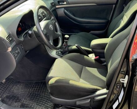 Чорний Тойота Авенсіс, об'ємом двигуна 2 л та пробігом 264 тис. км за 6780 $, фото 12 на Automoto.ua