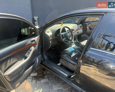 Чорний Тойота Авенсіс, об'ємом двигуна 2 л та пробігом 210 тис. км за 7500 $, фото 5 на Automoto.ua